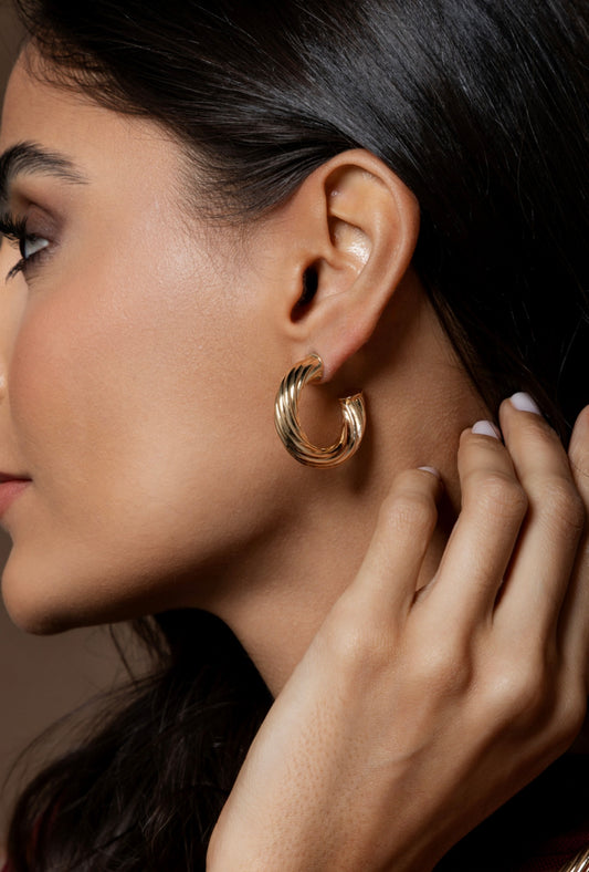 Twisted tube hoop earring