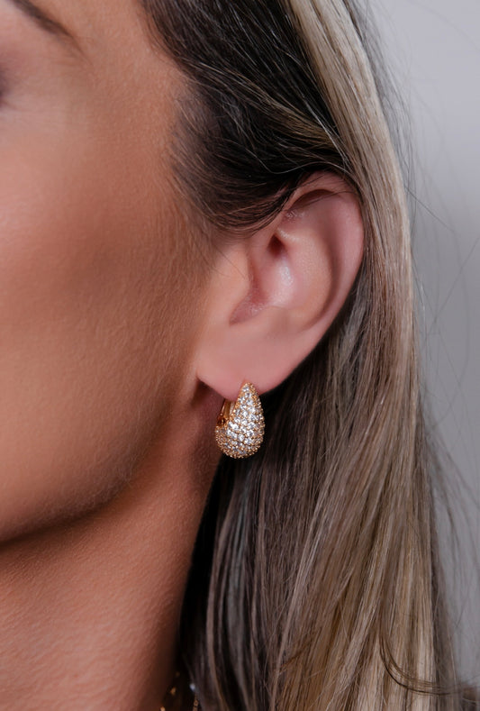 Small round hoop earring studded with micro zirconias